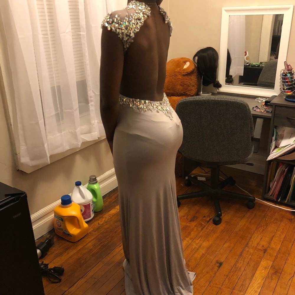 Powder gray gown with jewels